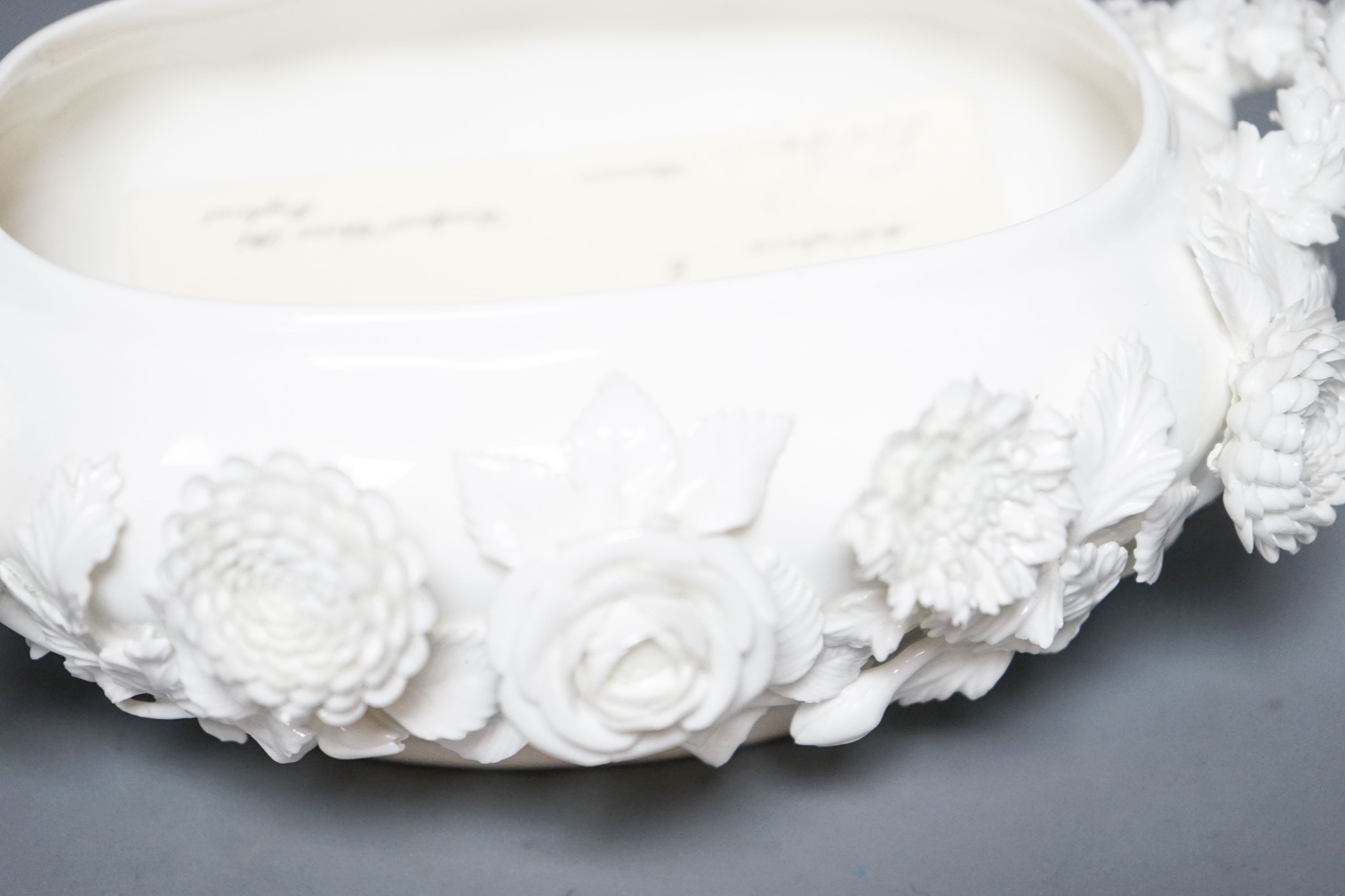 A Coalbrookdale by Coalport white glazed porcelain floral encrusted bowl and cover 23cm